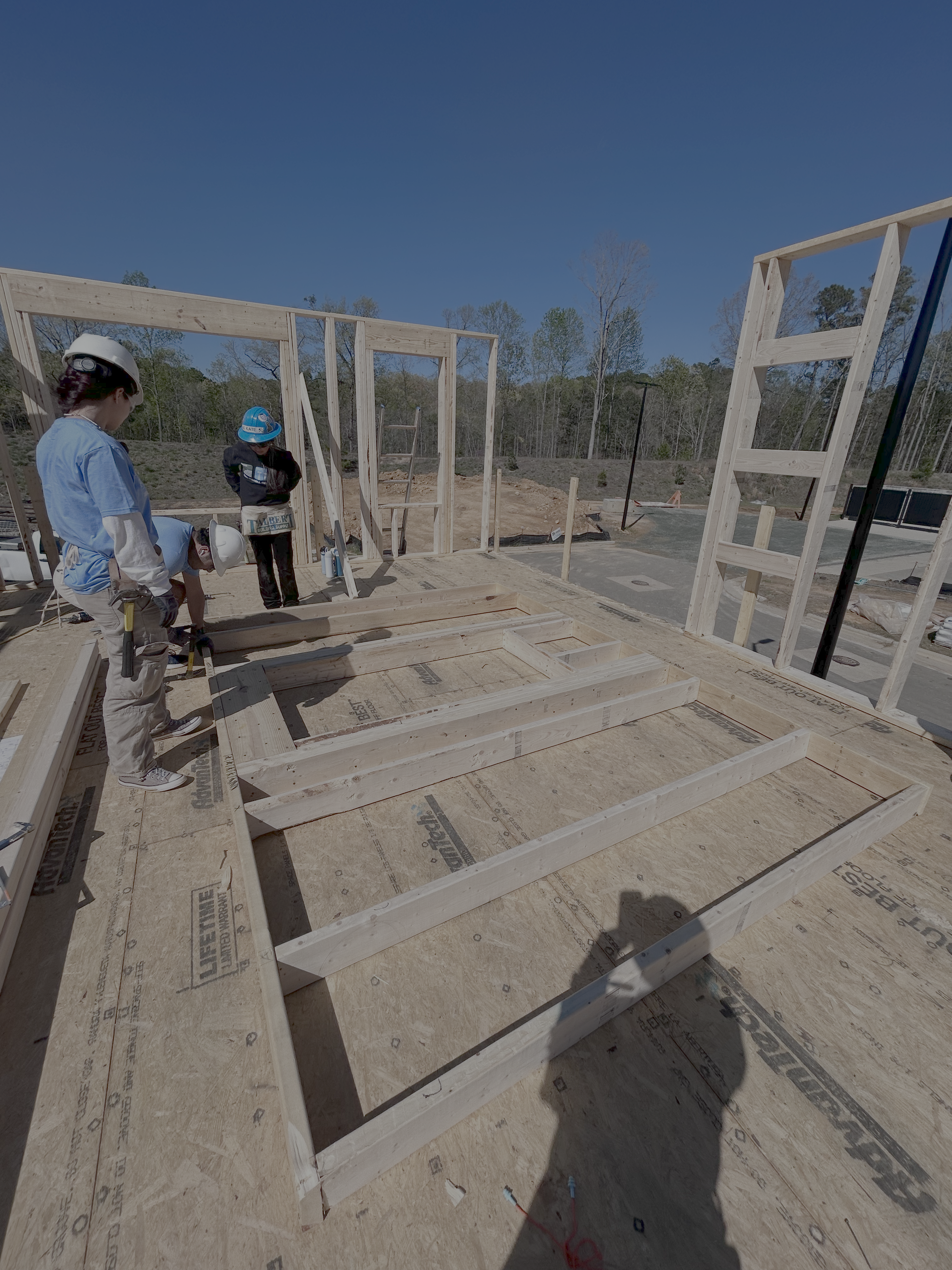 Ilia works at a Habitat for Humanity build.