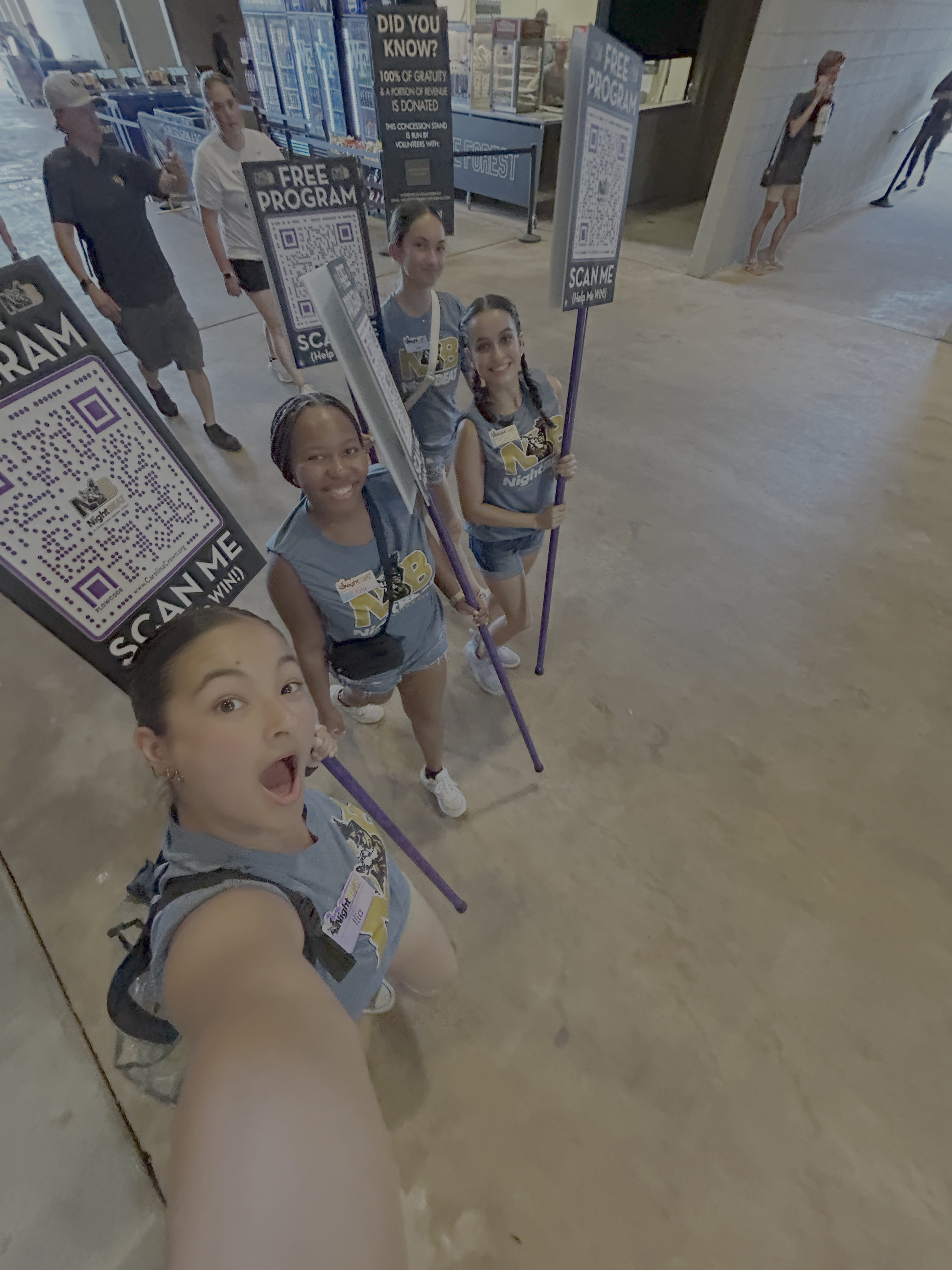 Ilia and friends volunteering at a marching band competition at Wake Forest.